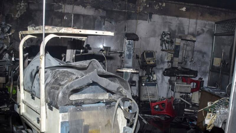 Equipment damaged by fire lies inside a neonatal intensive care unit at Jhansi Medical College...