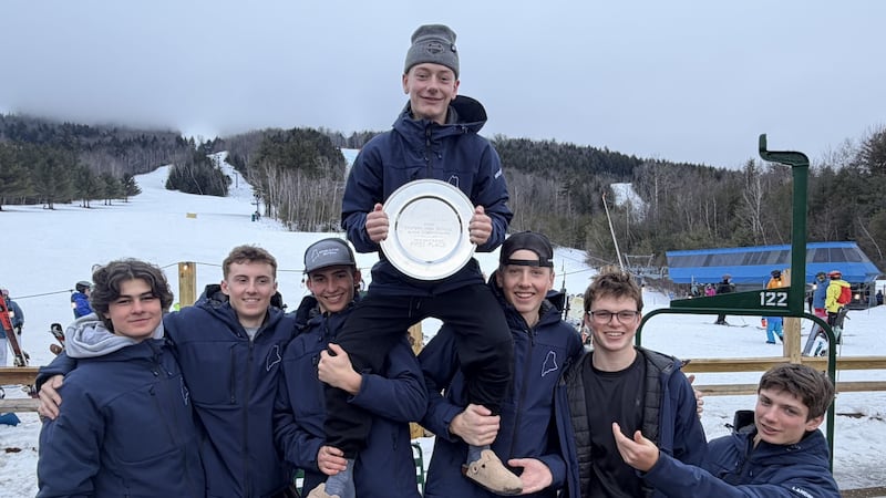 Reed Michaud celebrates with Team Maine.