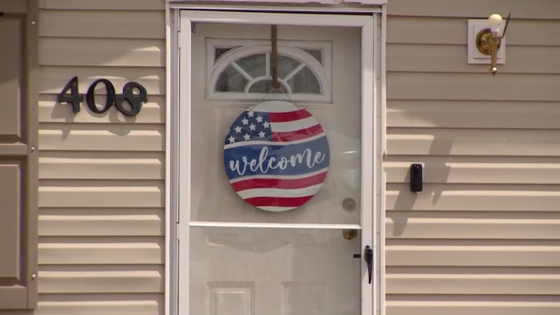 A woman says she does not plan to leave her home after it was sold following a court ruling....